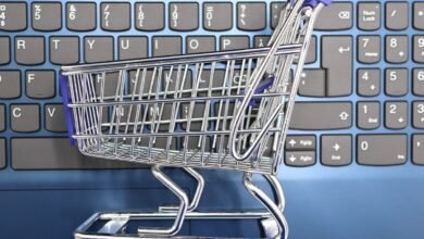 Shopping online on a laptop with Amazon cart items waiting to be bought