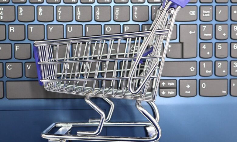 Shopping online on a laptop with Amazon cart items waiting to be bought