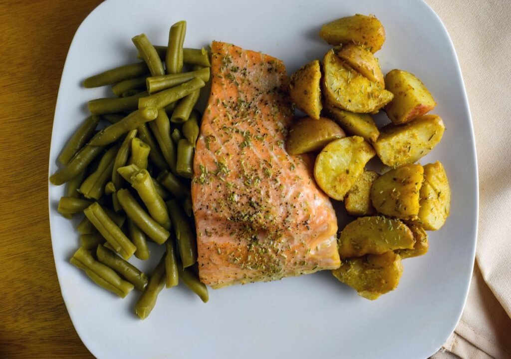 Plate with potatoes and green beans, simple foods that add chromium to a meal
