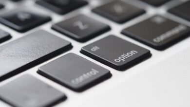 Laptop keyboard close-up showing keyboard letters wearing off