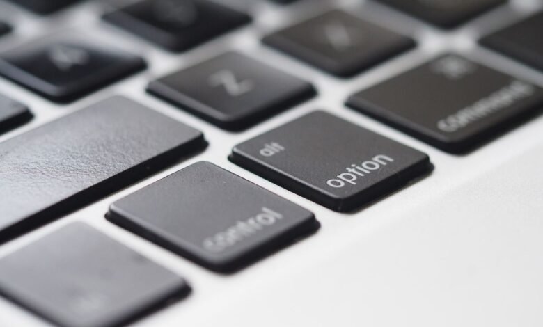 Laptop keyboard close-up showing keyboard letters wearing off