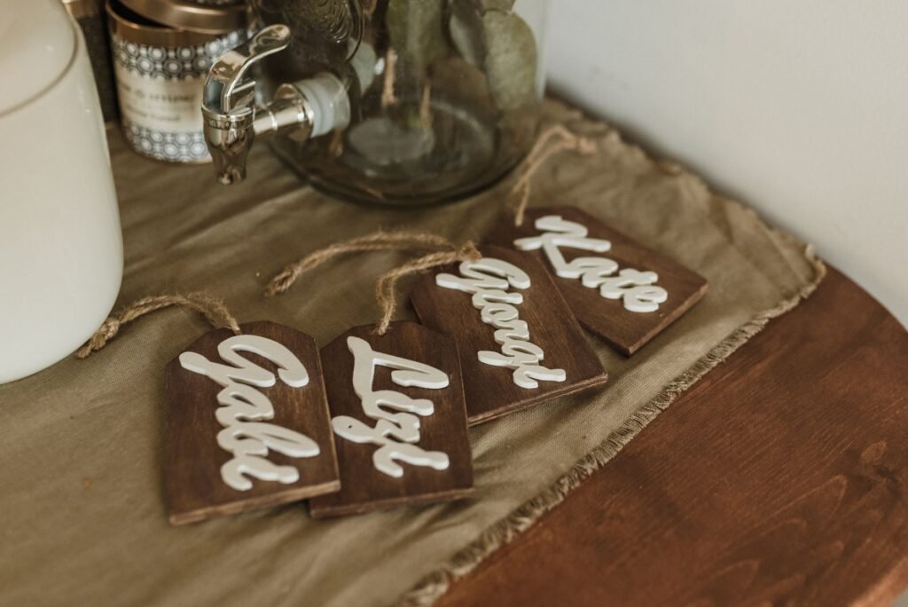 Wooden name tags on a table, a reminder of why do I forget names so fast after introductions